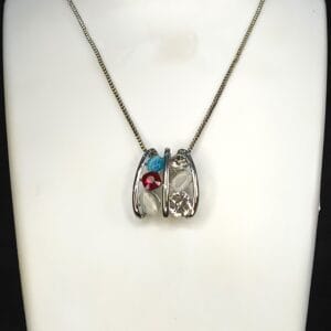 Silver plated Multi color stone AD studded chain pendant earrings set